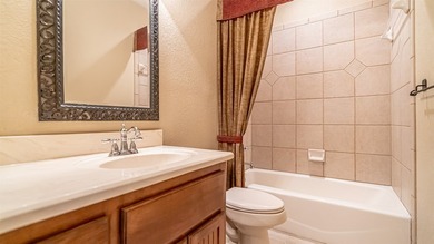 Beautifully maintained brick home with cut stone accents. Easy - photo 22