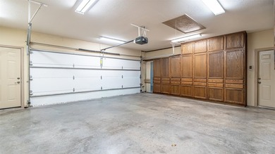 Beautifully maintained brick home with cut stone accents. Easy - photo 28