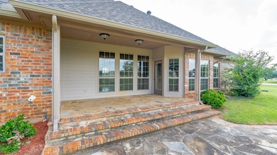 Beautifully maintained brick home with cut stone accents. Easy - photo 29