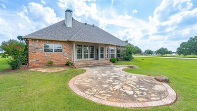 Beautifully maintained brick home with cut stone accents. Easy - photo 30