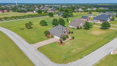 Beautifully maintained brick home with cut stone accents. Easy - photo 39