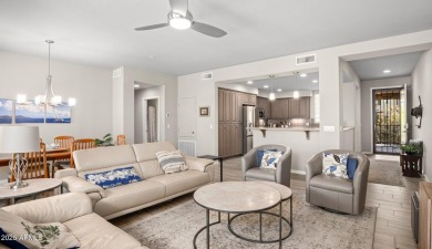 This highly upgraded North Scottsdale gated condominium offers