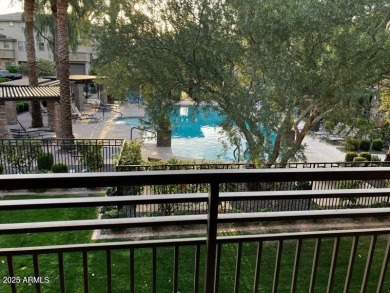 This highly upgraded North Scottsdale gated condominium offers