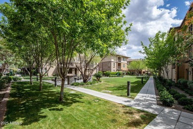 This highly upgraded North Scottsdale gated condominium offers