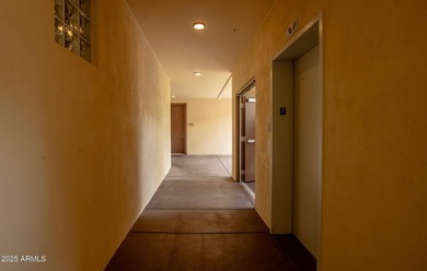 This highly upgraded North Scottsdale gated condominium offers