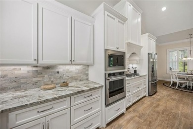 Welcome to refined coastal living in the highly sought-after - photo 17