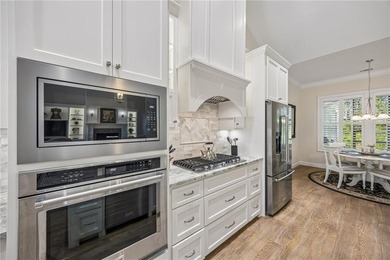 Welcome to refined coastal living in the highly sought-after - photo 18