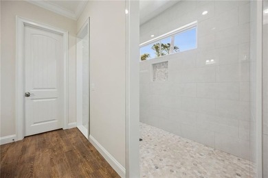 Welcome to refined coastal living in the highly sought-after - photo 34