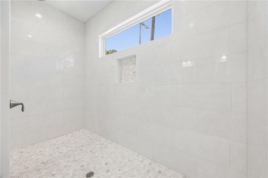 Welcome to refined coastal living in the highly sought-after - photo 38