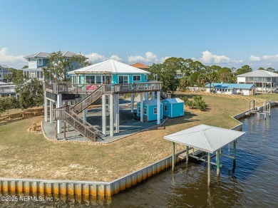 This 3-bedroom 2 bath is a Octagon home on .333 acres is built - photo 4