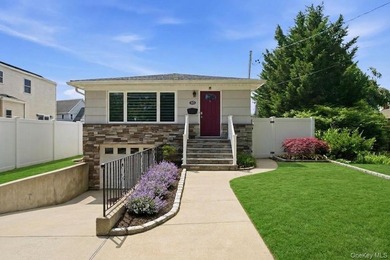 Refined comfort meets effortless Long Island living in this - photo 1