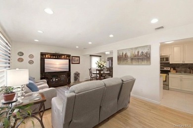 Refined comfort meets effortless Long Island living in this - photo 3