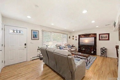 Refined comfort meets effortless Long Island living in this - photo 4