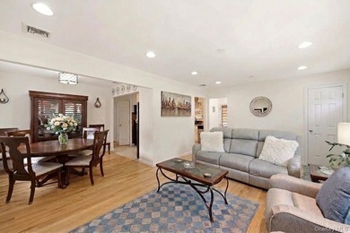 Refined comfort meets effortless Long Island living in this - photo 5
