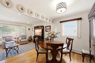 Refined comfort meets effortless Long Island living in this - photo 6