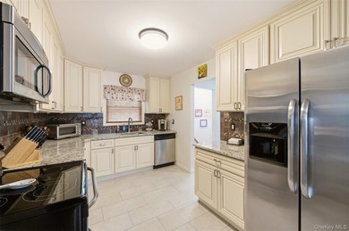 Refined comfort meets effortless Long Island living in this - photo 9