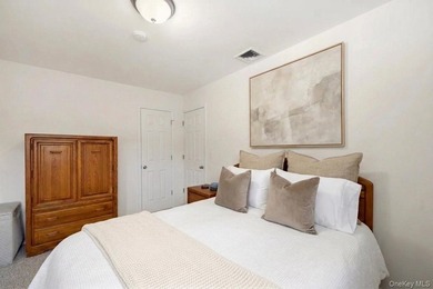 Refined comfort meets effortless Long Island living in this - photo 10