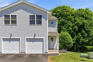Welcome to this well-maintained 2-bedroom, 1.5-bath condominium - photo 2