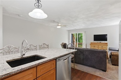 Welcome to this well-maintained 2-bedroom, 1.5-bath condominium - photo 10