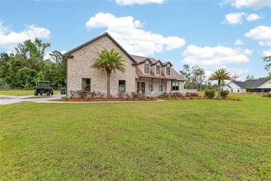Beautiful brick home situated on nearly 3 acres in the gated - photo 12