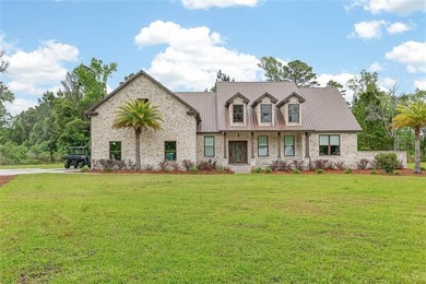 Beautiful brick home situated on nearly 3 acres in the gated - photo 13