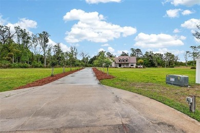 Beautiful brick home situated on nearly 3 acres in the gated - photo 15