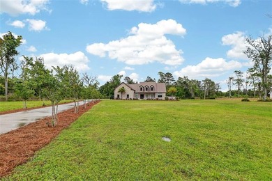 Beautiful brick home situated on nearly 3 acres in the gated - photo 18