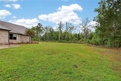 Beautiful brick home situated on nearly 3 acres in the gated - photo 21