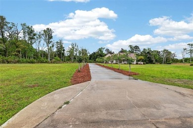 Beautiful brick home situated on nearly 3 acres in the gated - photo 32
