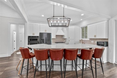 Beautiful brick home situated on nearly 3 acres in the gated - photo 40