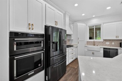 Beautiful brick home situated on nearly 3 acres in the gated - photo 42