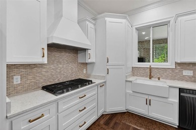 Beautiful brick home situated on nearly 3 acres in the gated - photo 43