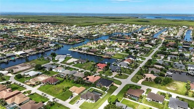 WELCOME TO A SUN-DRENCHED RETREAT IN ONE OF CAPE CORAL'S MOST - photo 49