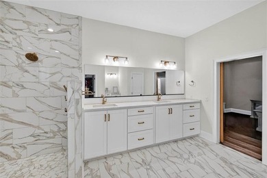 Beautiful brick home situated on nearly 3 acres in the gated - photo 51