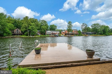 Nestled in a peaceful cove with stunning main lake views and - photo 5