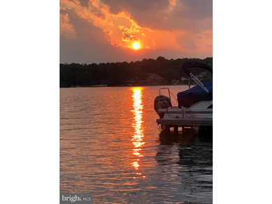 Nestled in a peaceful cove with stunning main lake views and - photo 7