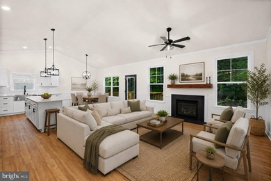 Nestled in the serene Lake of the Woods community, this stunning - photo 2