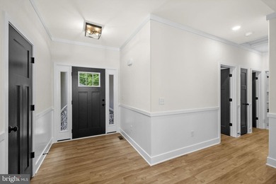 Nestled in the serene Lake of the Woods community, this stunning - photo 10