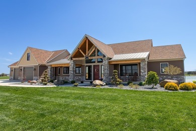 Award-winning luxury meets breathtaking waterfront views in this - photo 1