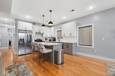 Welcome to this refined 3-bedroom, 2-bathroom home offering - photo 2