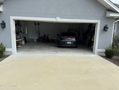 House features a large lot on approximately 30 Acre Lake, Stucco - photo 29