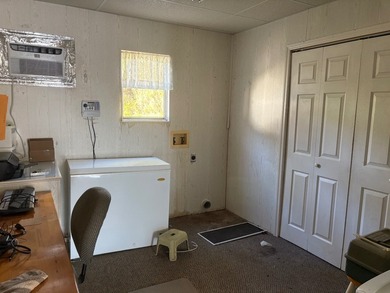 This is a must see property. Enclosed 4 season porch, separate - photo 10
