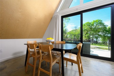 Elevated open water views pair with lake access at this A-frame - photo 11