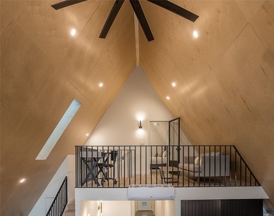 Elevated open water views pair with lake access at this A-frame - photo 13