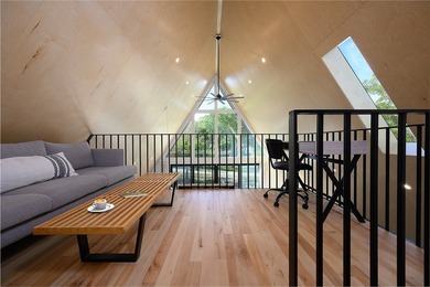Elevated open water views pair with lake access at this A-frame - photo 14