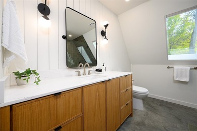Elevated open water views pair with lake access at this A-frame - photo 21