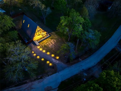 Elevated open water views pair with lake access at this A-frame - photo 26