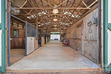Just beyond a gated entrance and surrounded by beautifully - photo 29