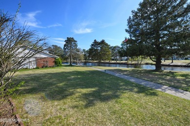 Welcome to the charming 55+ gated community of Leisure Village - photo 7