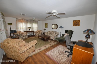 Welcome to the charming 55+ gated community of Leisure Village - photo 9
